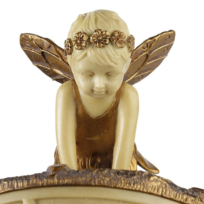 A PONDERING FAIRY COLLECTIBLE BOX